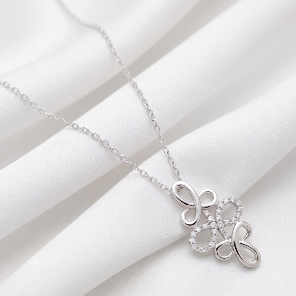 Floral Knot Diamond Pendant Necklace – 0.10 CT. TW. in 10K White Gold